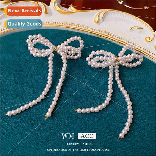 lver needle French pearl bow tassel earrings niche versatile