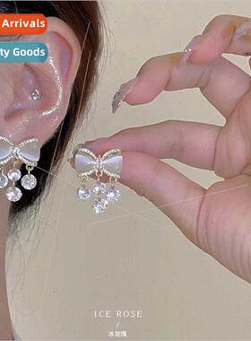 Cat eye stone French bow with diamonds zirconia tassel earri