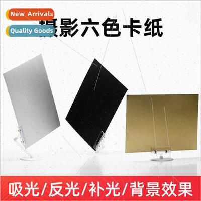 Photography cardboard gold silver black whe background refle