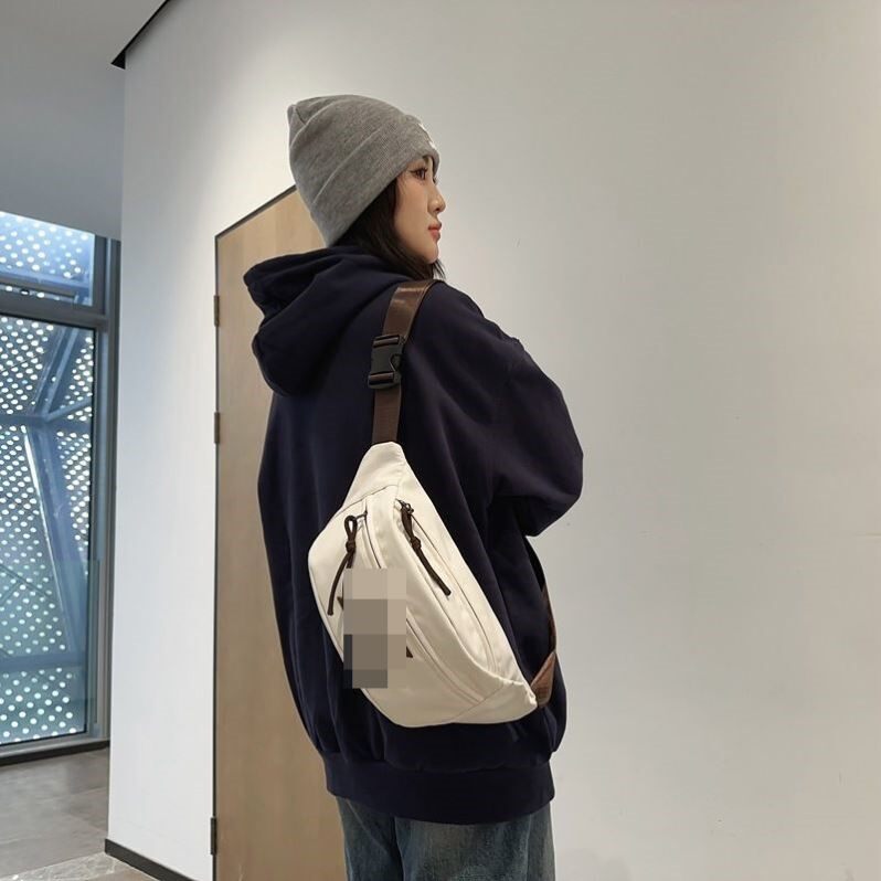 胸包里款ins潮牌斜挎包男生休闲腰包单肩包女新款运动男士小垮包