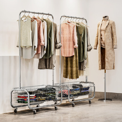 首奇服装店金属带轮可移动