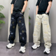 潮流痞帅美式 高街泼墨弯刀牛仔男士 裤 秋季 宽松直筒做旧磨破阔腿裤