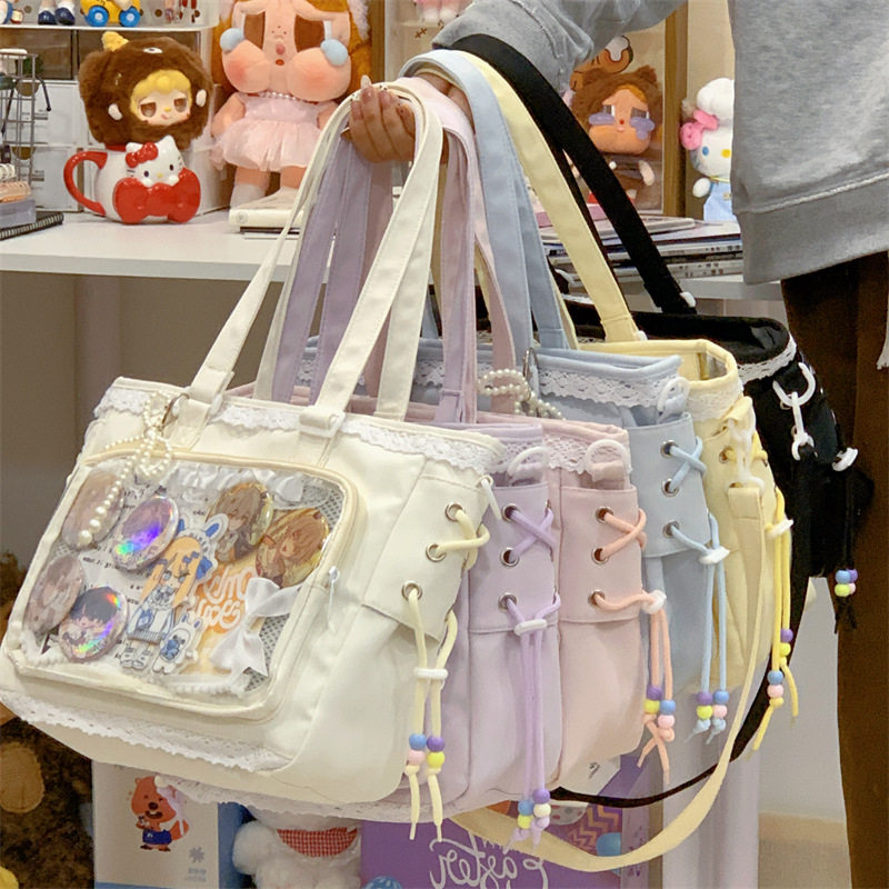日系学院少女斜挎包包女大容量透明单肩包谷子吧唧大食量蕾丝痛包