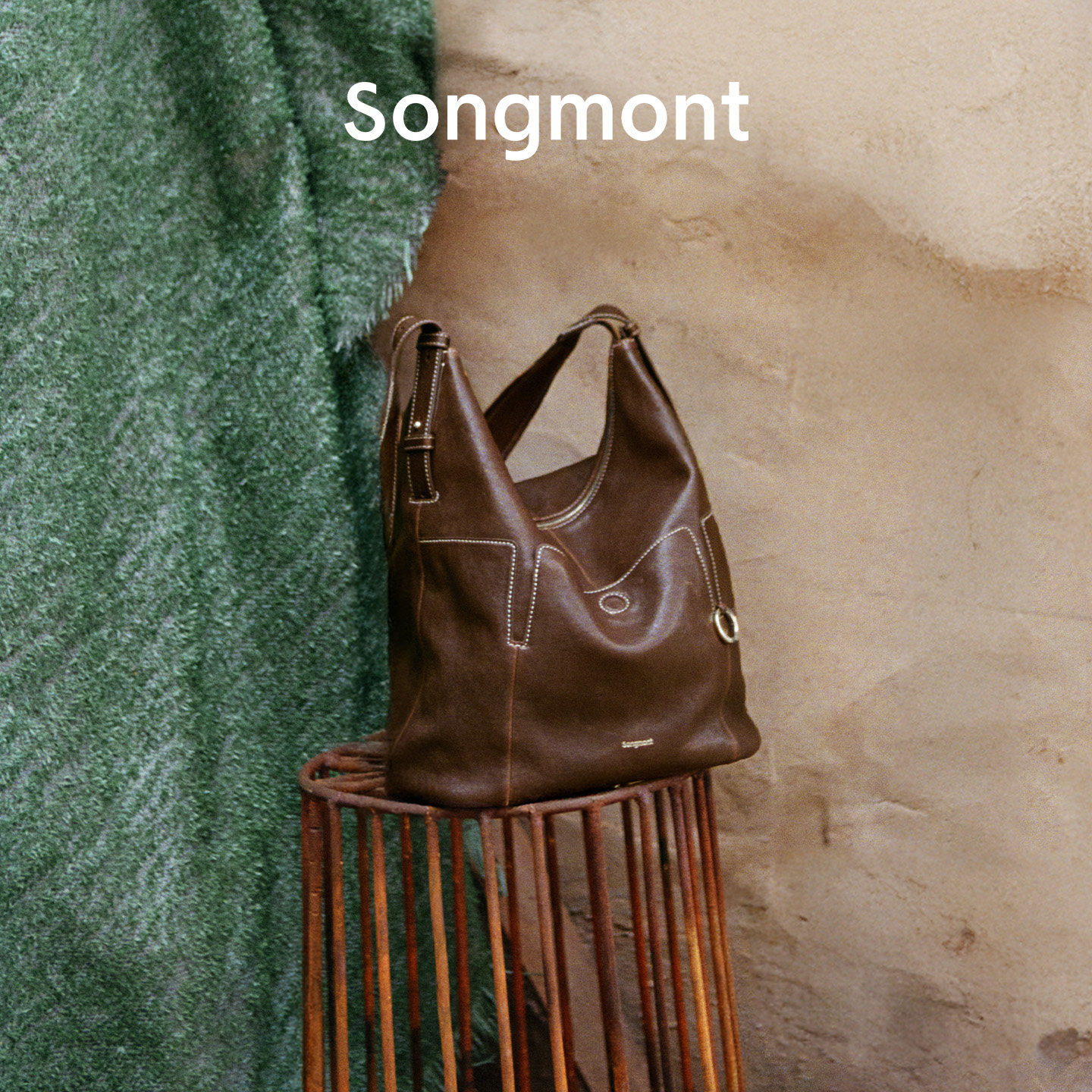Songmont山下有松植鞣羊皮循迹软枕水桶包通勤大容量斜挎单肩包