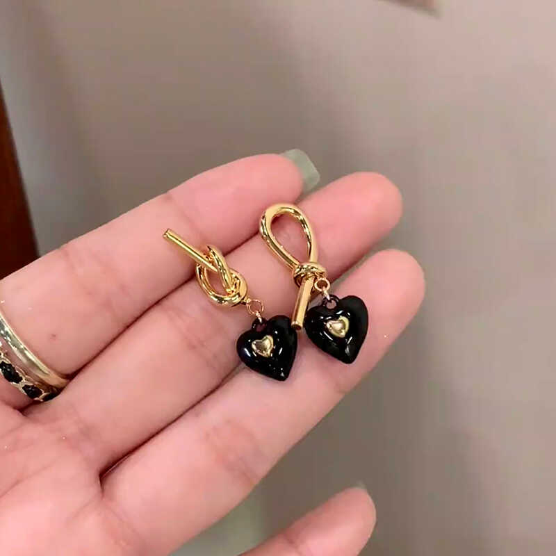 不对称绳结黑色爱心耳钉925银