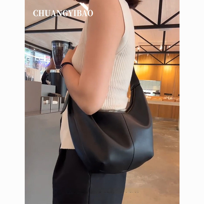 小众高级感软皮饺子包包女式2025新款潮大容量黑色轻奢通勤斜挎包
