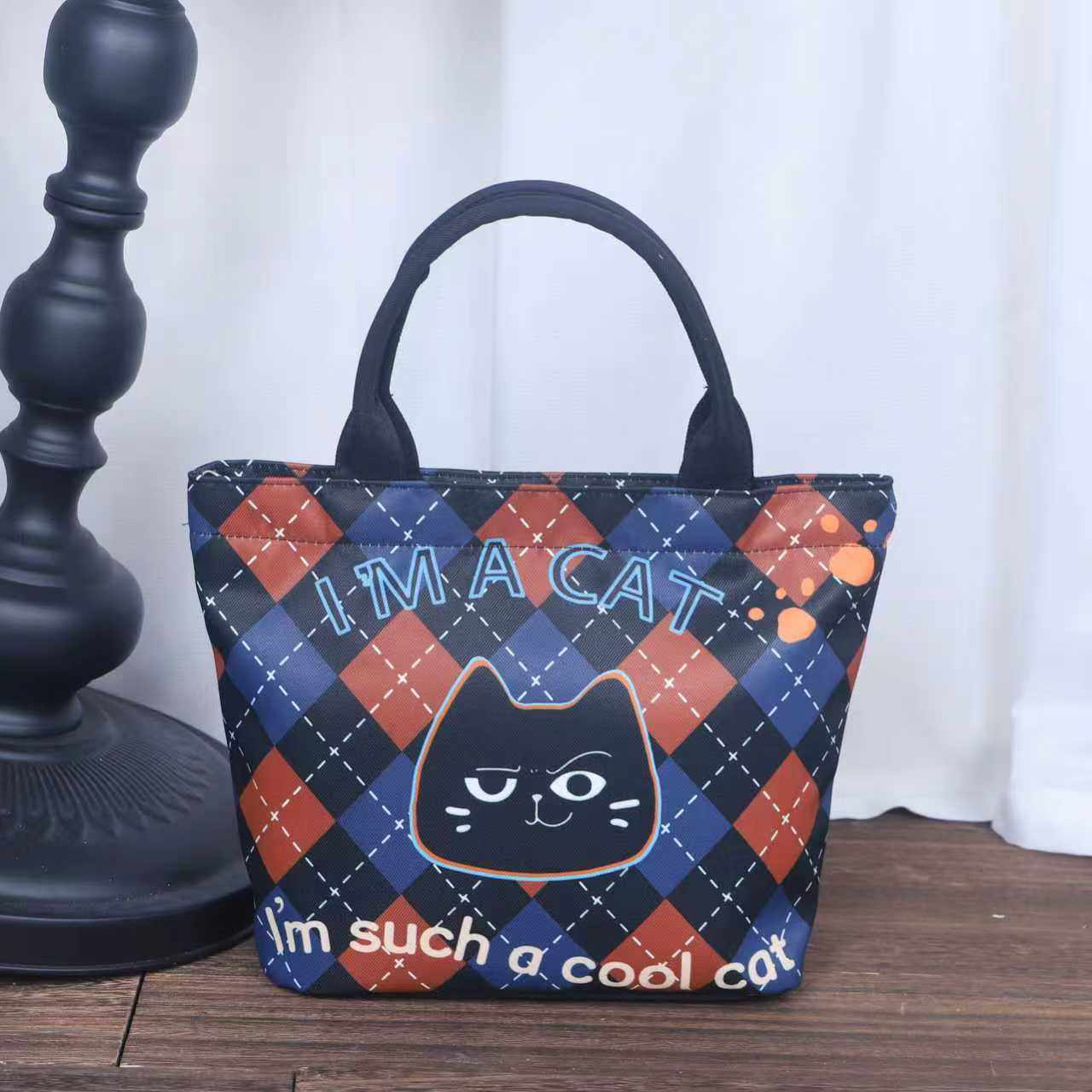 尚盈冷酷猫斜纹防水手提袋上班族通勤外出杂物收纳时尚手拎包包