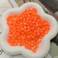 Оранжевые бусины из рогов разных размеров (50 г в пакетике)