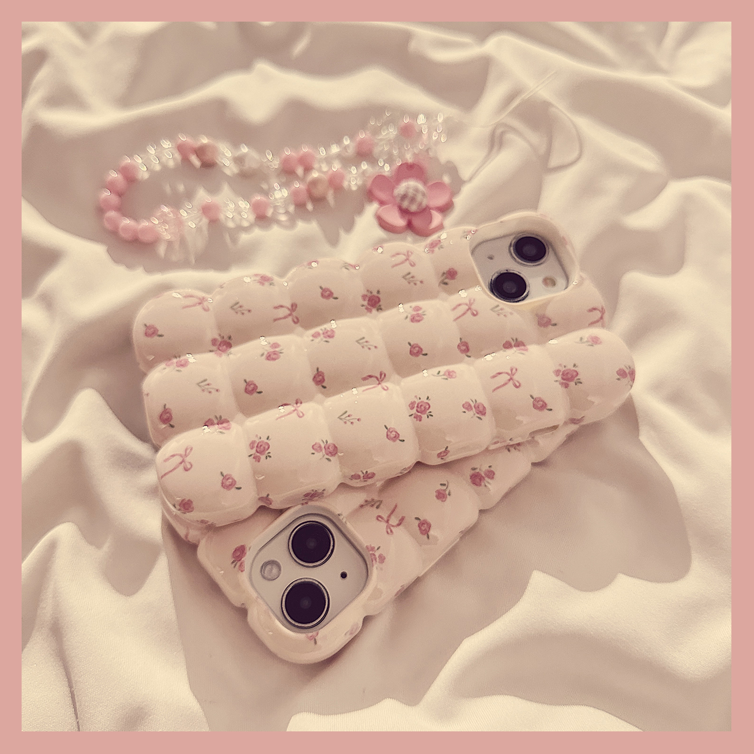粉色蝴蝶结碎花适用苹果15手机壳