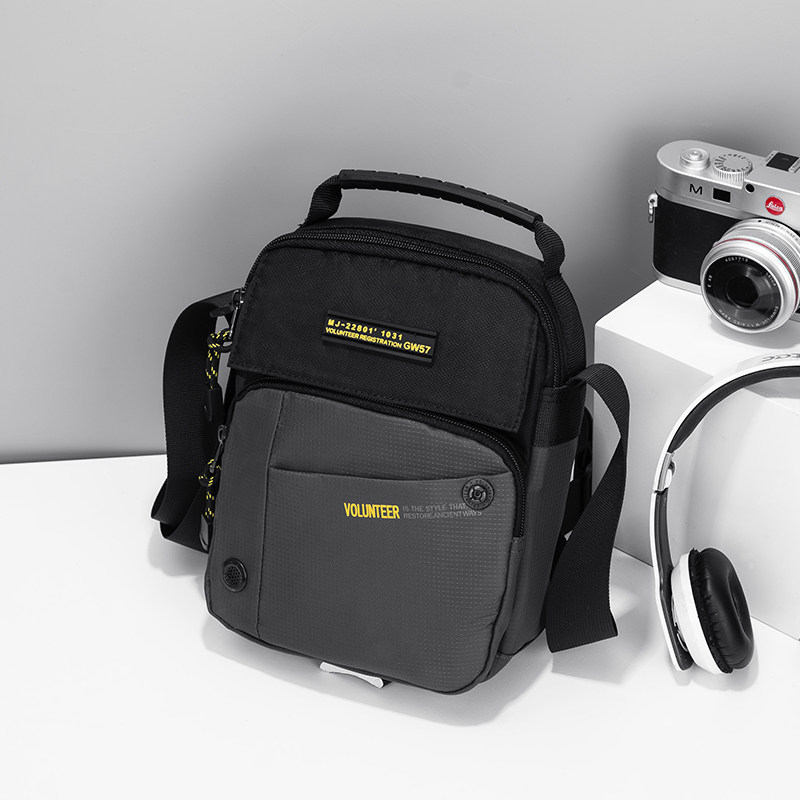 夏季新款男士帆布斜挎包时尚单肩包男轻便手提包小包男牛津布包潮