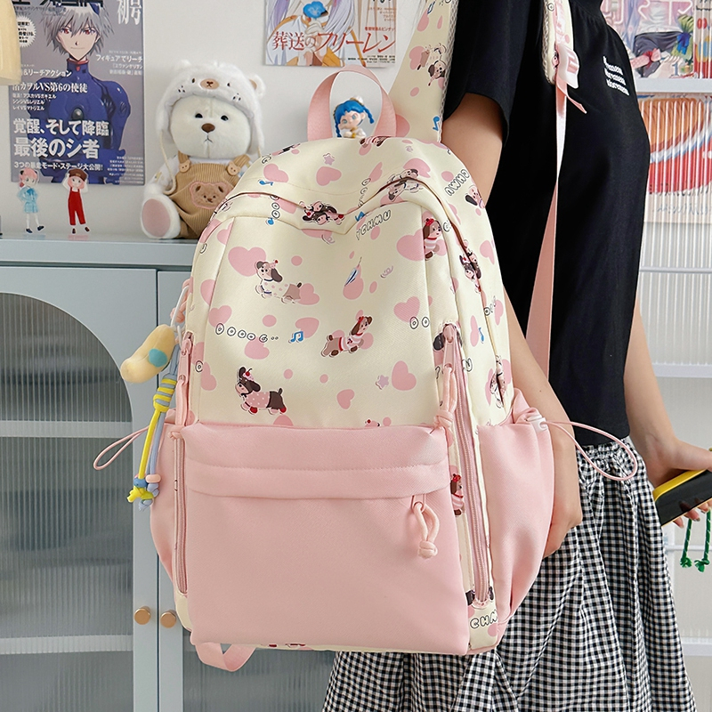 书包女生小学生2025新款小众小狗印花背包初中生可爱痛包双肩包