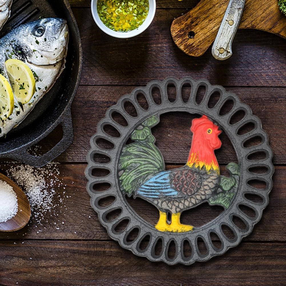 intricately carved trivet mat multi-use iron cast cock table