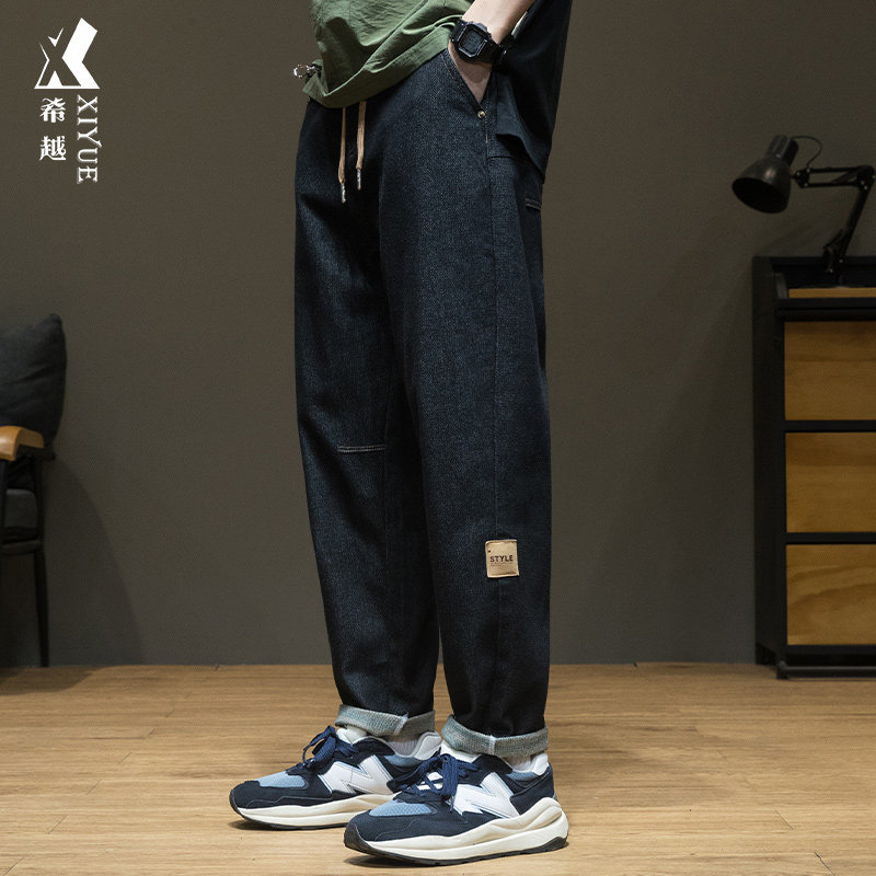 黑色松紧腰抽绳牛仔裤男秋冬季加大宽松加大码直筒裤子加绒长裤潮