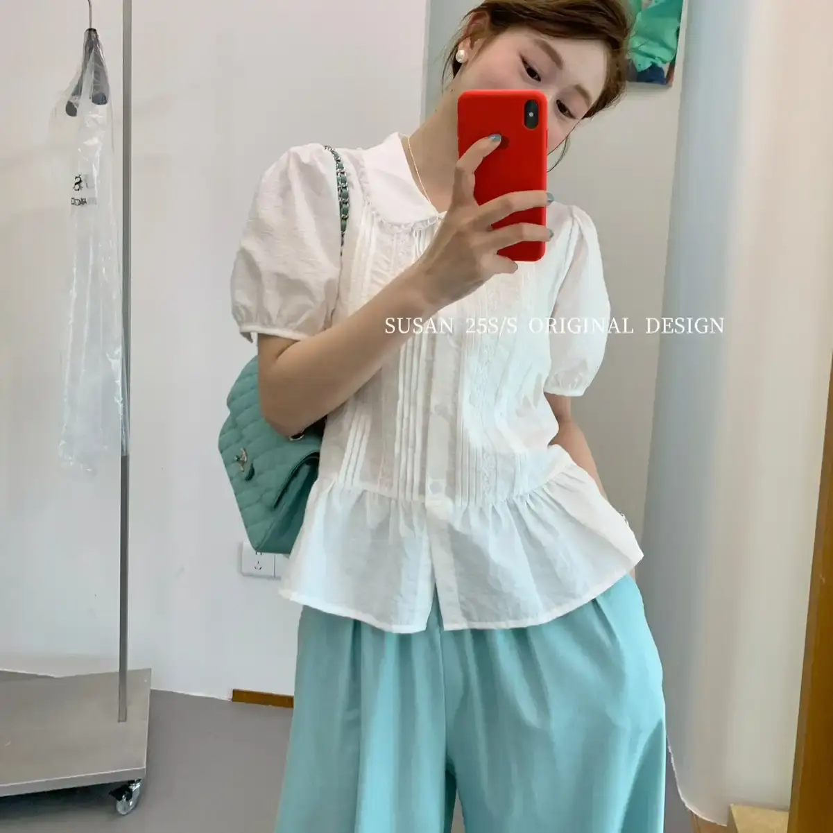 SUSAN 2025夏季新款法式娃娃领蕾丝设计感荷叶边短袖衬衫女TW392