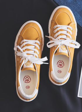 人本黄色帆布鞋女2026春季新款低帮学生休闲运动板鞋百搭平底球鞋