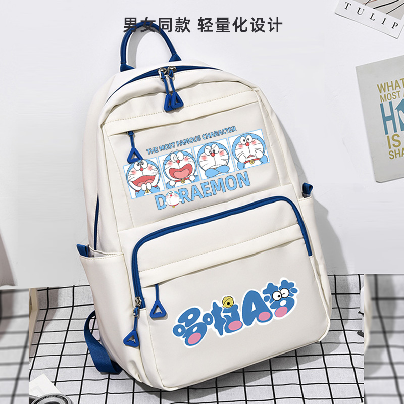 哆啦A梦书包2024男女小学生初中高颜值大容量轻便软蓝色背包
