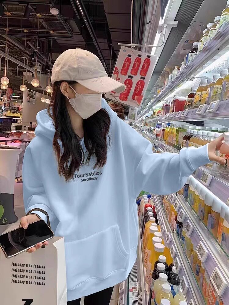 时髦蓝色中长款连帽卫衣女春秋新款宽松慵懒风搭配鲨鱼裤的上衣