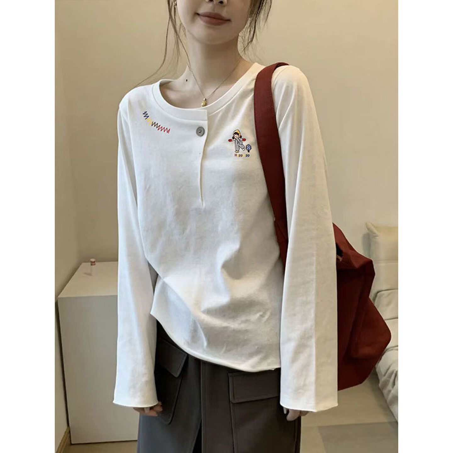 欧货一粒扣白色长袖T恤女2026新款春秋纯棉内搭打底衫显瘦上衣