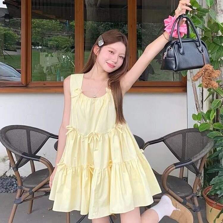 甜美蝴蝶结黄色背心吊带小个子连衣裙女夏季2026新款宽松蓬蓬短款