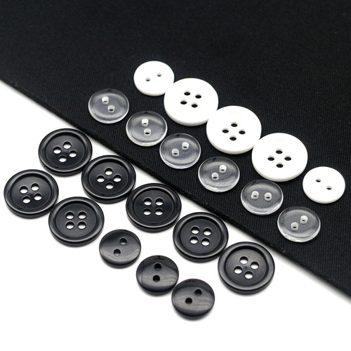 高档纽扣扣子黑白透明西装