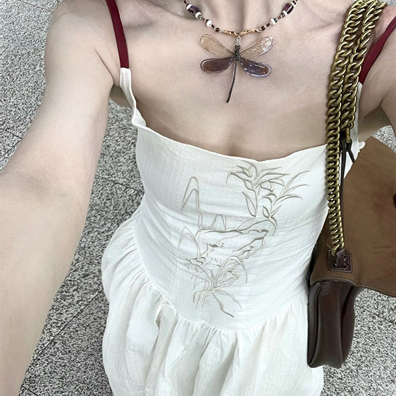 法式白色吊带连衣裙女夏季海边度假长裙小个子设计感小众碎花裙子