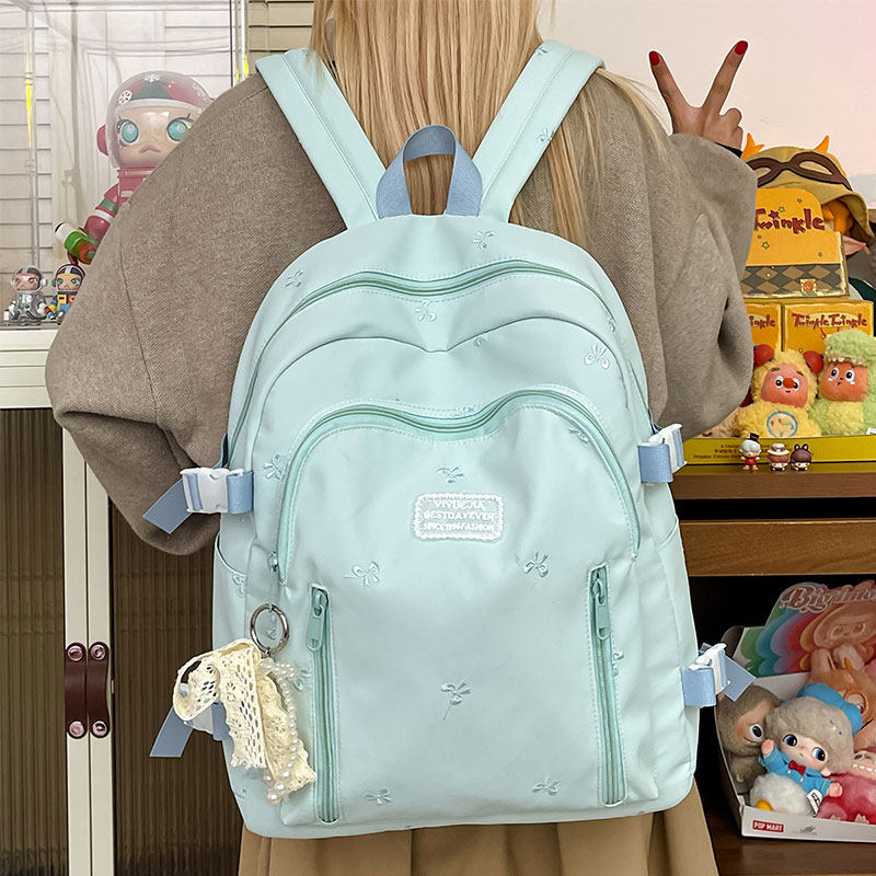 日系少女风双肩包女学生百搭蝴蝶结书包可爱软妹多层轻便电脑背包