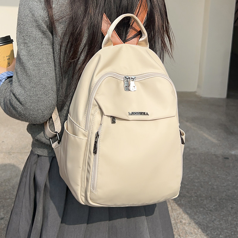 潮流双肩包女2024新款高颜值通勤女士背包防水轻便百搭旅行小书包