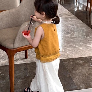 韩国童装2026夏季新款桔黄色花边拼接针织背心女童白色蓬蓬提花裤