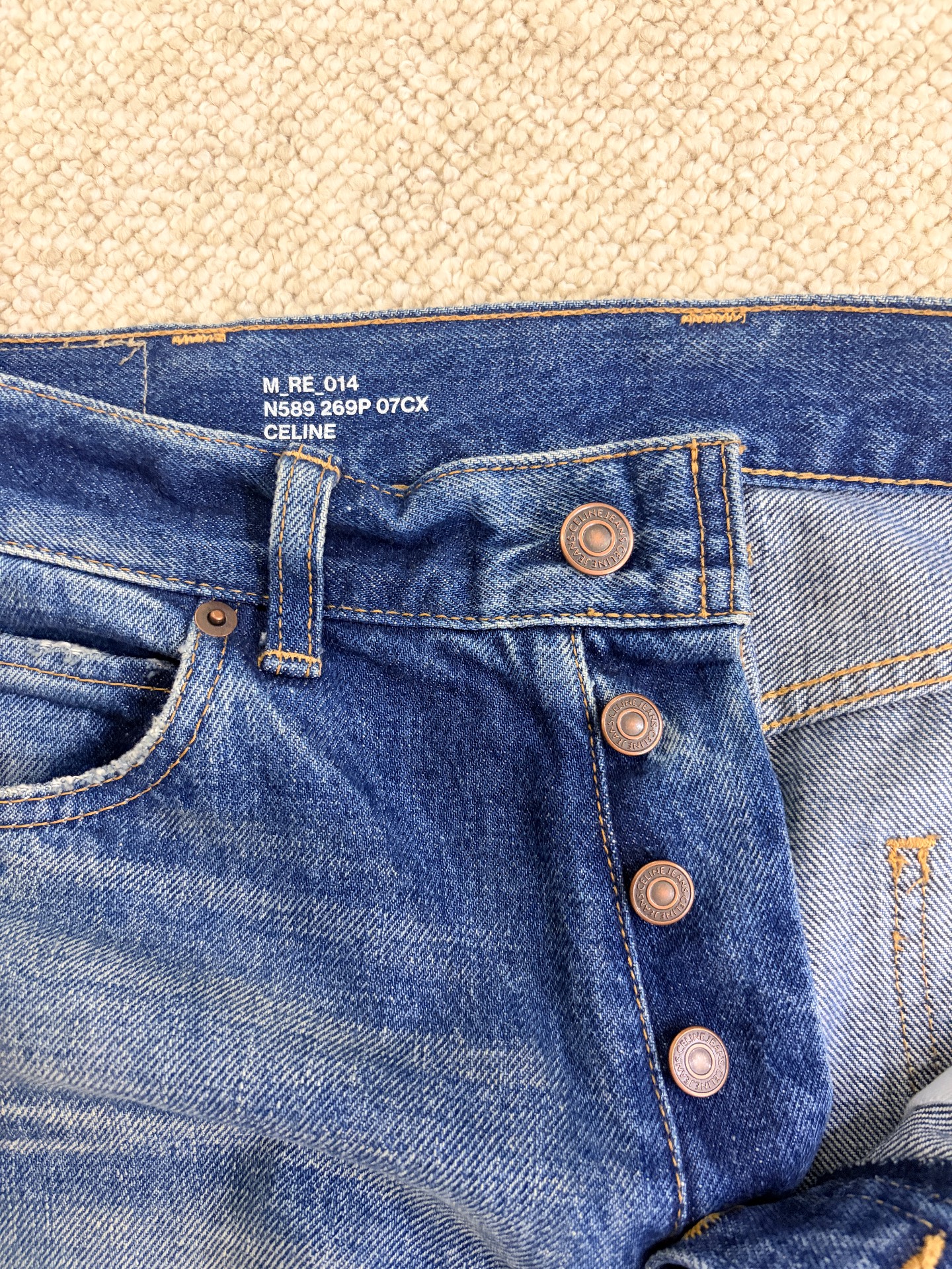 Celine Straight-Leg Knee-Cut Distressed Jeans — label