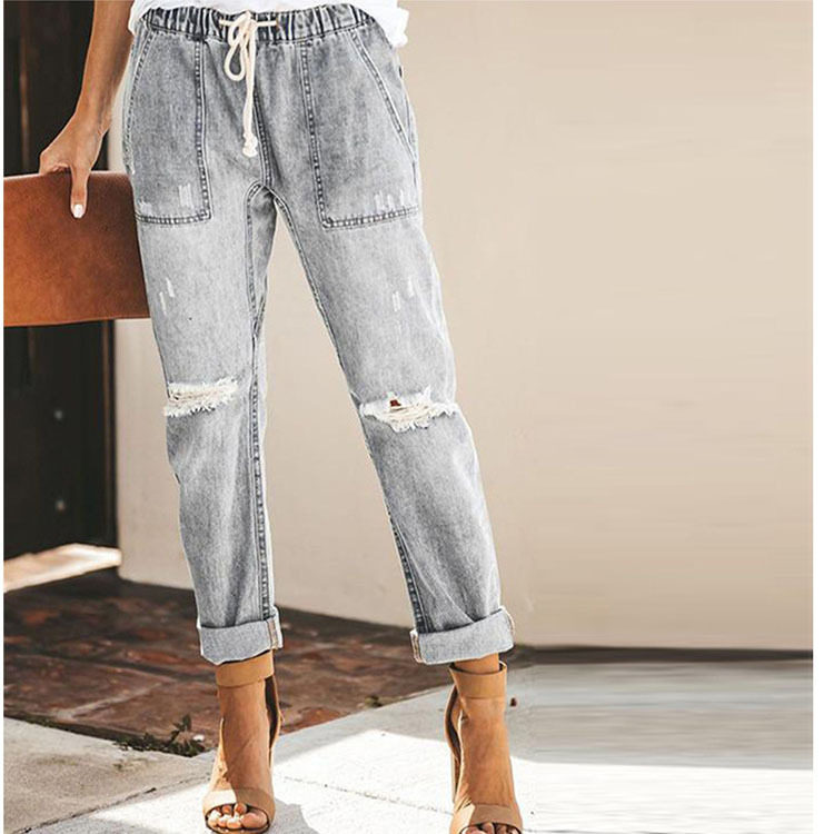 Women drawstring elastic waistband ripped denim pants牛仔裤