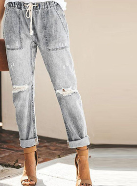 Women drawstring elastic waistband ripped denim pants牛仔裤