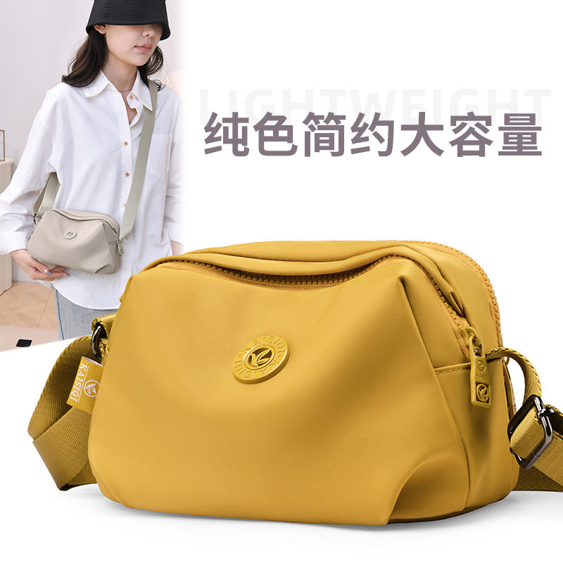 大肚包女士单肩斜挎包轻便多分区