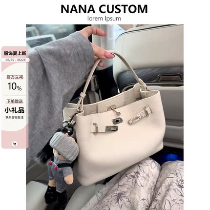 小众白色托特包包女通勤百搭手提水桶包大容量真皮单肩斜挎子母包