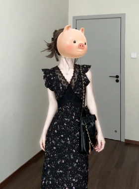 黑色蕾丝拼接碎花连衣裙夏季度假风法式气质独特漂亮斜裁掐腰长裙