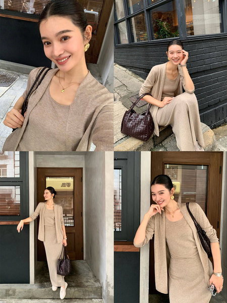 Beige knit cardigan and dress set worn with a woven dark handbag