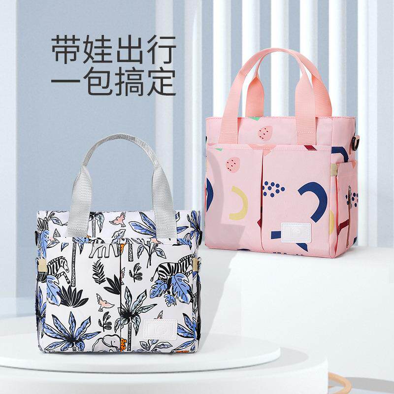 时尚妈咪包2025多功能大容量多功能收纳包单肩斜挎可挂童车母婴包