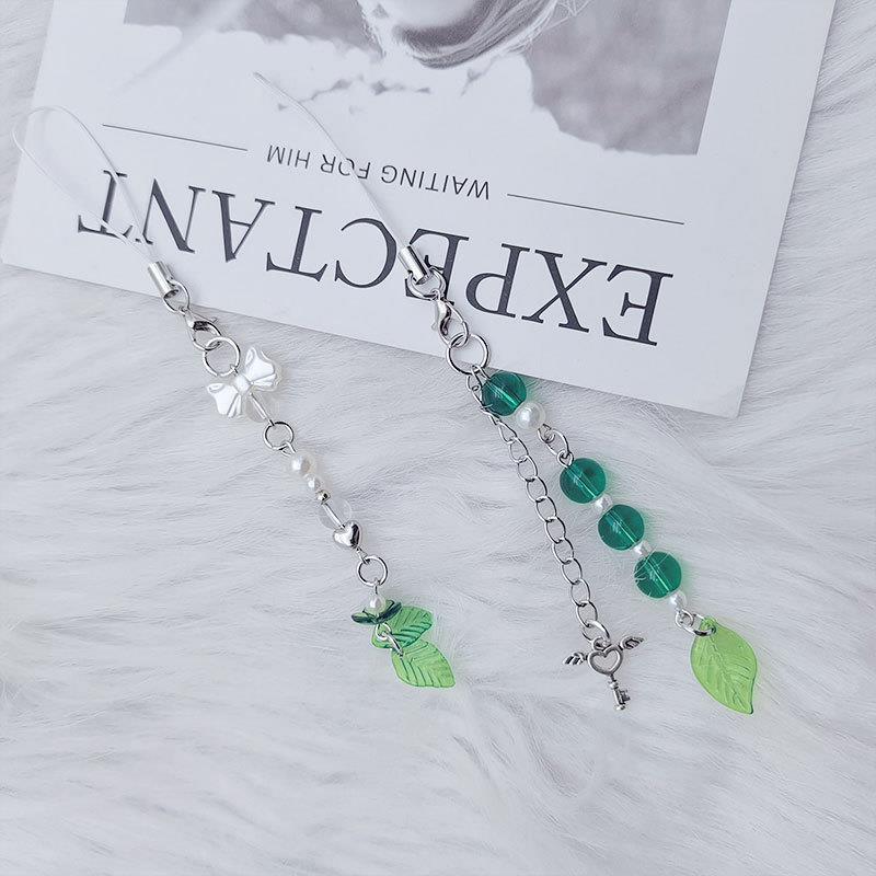 日韩ins蝴蝶结爱心钥匙圆珠叶片手机链森系超仙学生百搭包包挂件