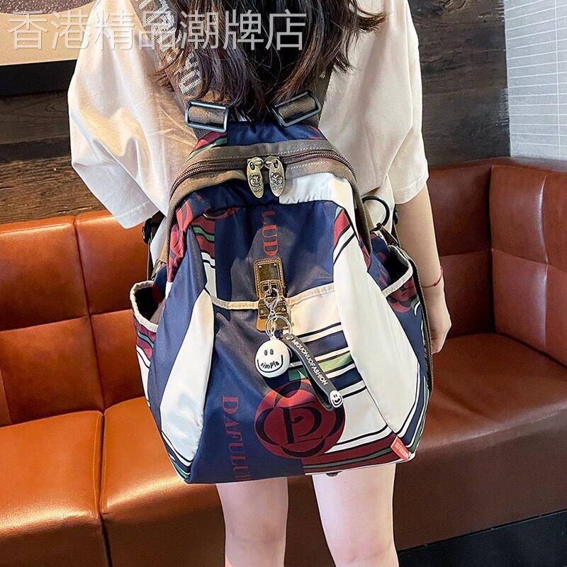 代购月光蓝轻便大容量双肩包2025新款潮流休闲旅行背包斜挎女士包