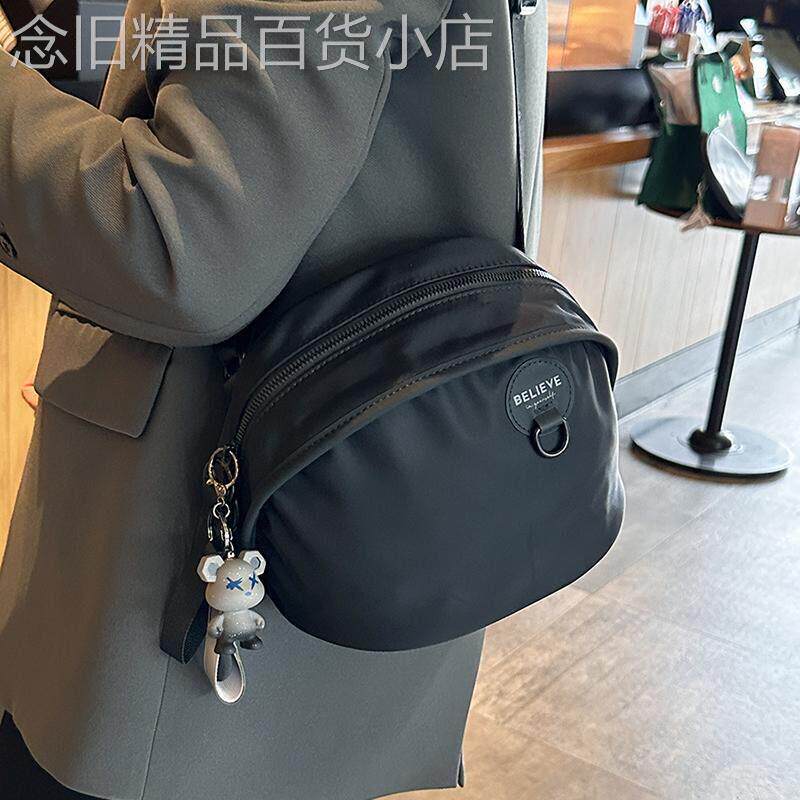 法国ZAMP秋季女新款时尚牛津布包贝壳包休闲斜揹包轻便拉炼单肩包