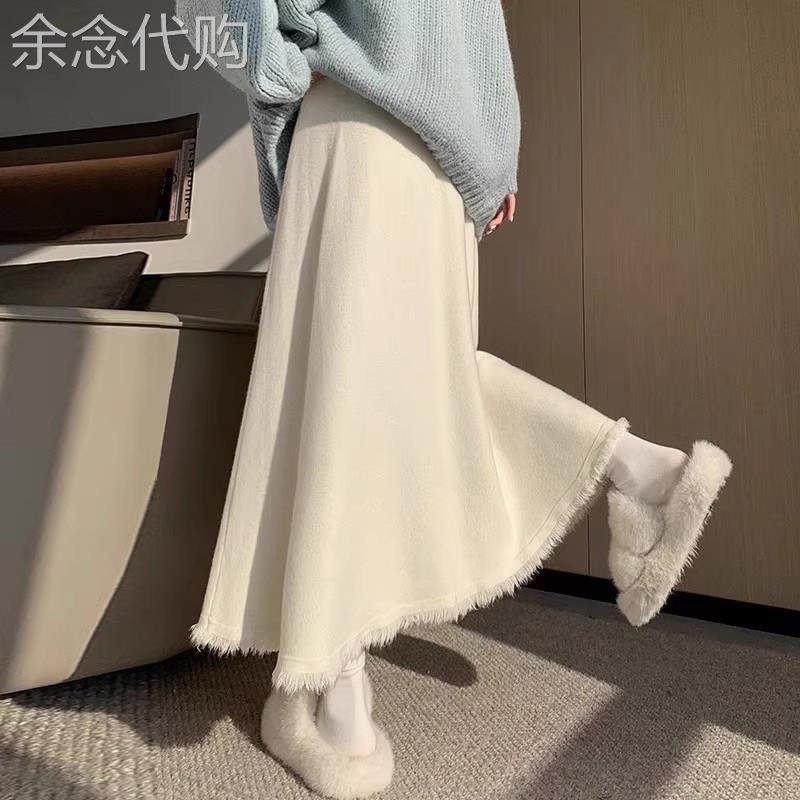 白色针织垂感半身裙女时尚百搭2026新款春秋长款高腰a字大摆伞裙