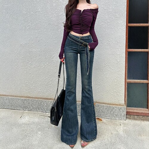 设计感斜腰带微喇牛仔裤女
