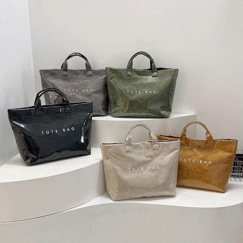 大容量杜邦纸果冻包时尚透明PVC防水手提袋上班通勤托 托特包妈咪