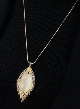 时尚金色水滴羽毛毛衣链女网红爆款轻奢气质百搭小众设计感毛衣链