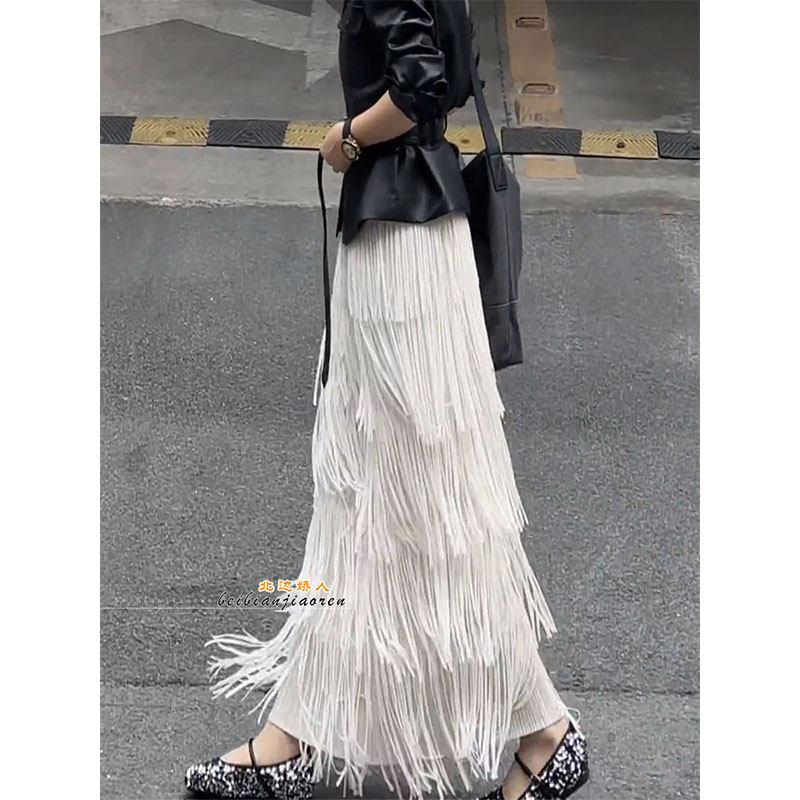 设计感重工流苏蛋糕半身裙女2026新款气质百搭通勤显瘦垂感中长裙