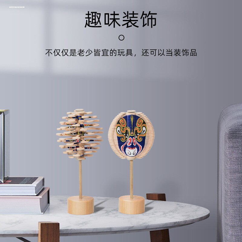 网红新款斐波那契螺旋树木质旋转手摇脸谱玩具解压变脸棒棒糖陀螺
