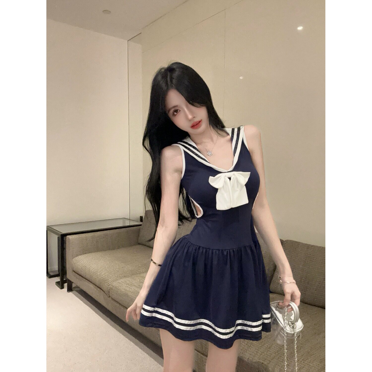 辣妹学院风低胸蝴蝶结镂空无袖包臀裙性感显瘦黑白条纹A字连衣裙
