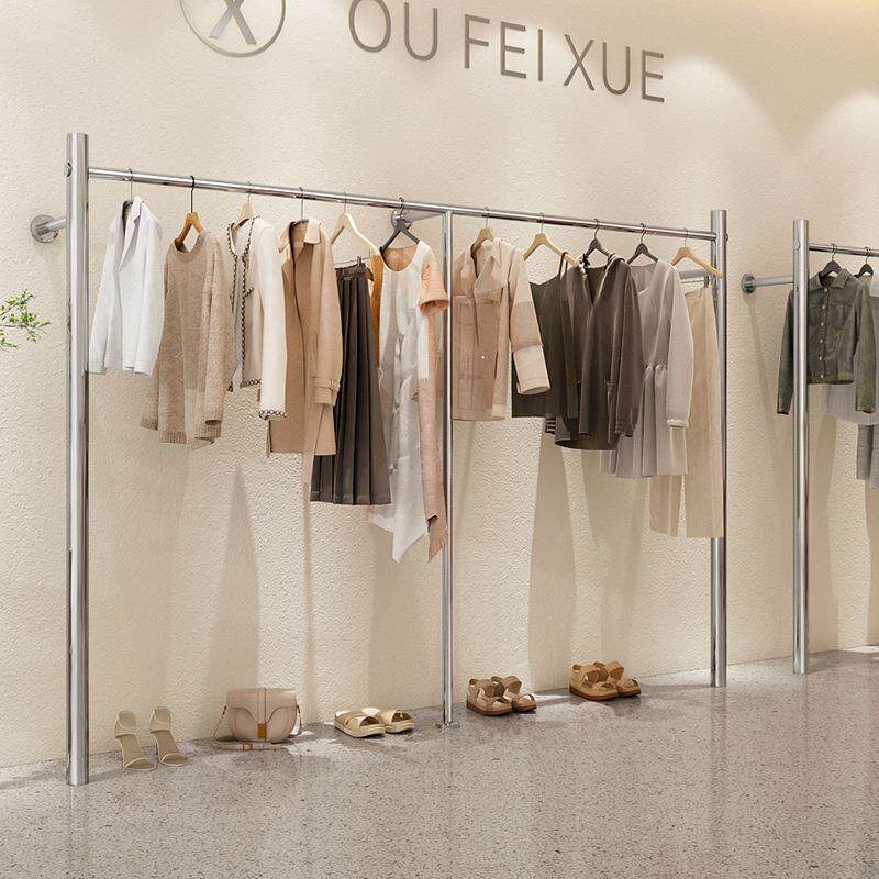 高端服装店网红货架展示架陈列架上墙不锈钢女装店挂衣架上墙架