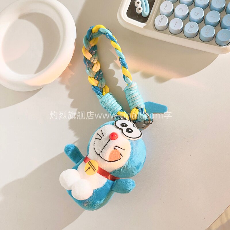 趣味卡通可爱毛绒机器猫叮当猫公仔手机壳挂件多功能编织带尼龙短款麻花挂绳网红学生女款钥匙包挂饰便携手环
