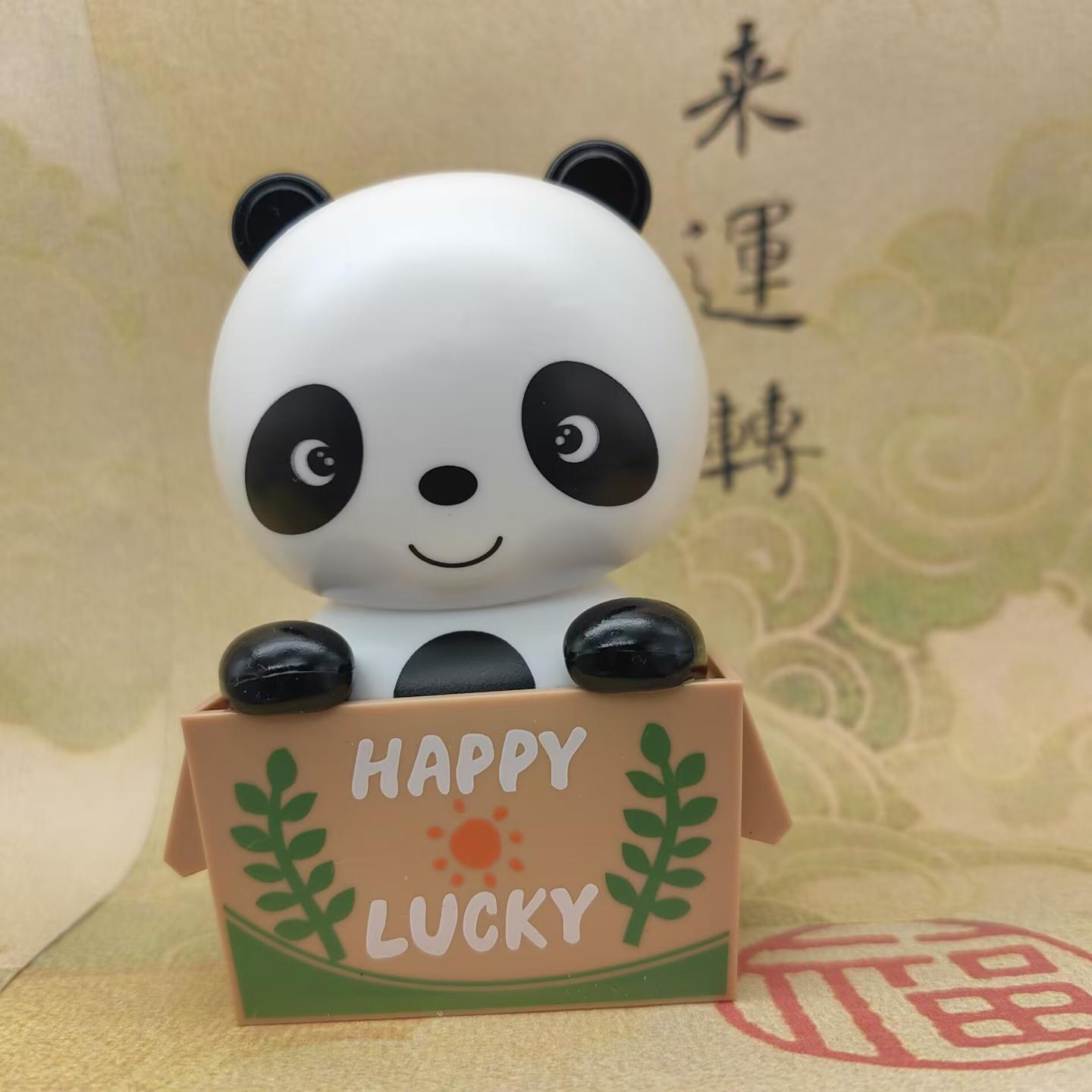 创意太阳能摇头熊猫汽车卡通花篮