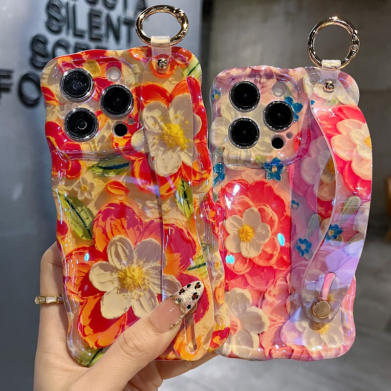适用苹果系列iPhone17新款手机壳15pro14promax优雅橙色花蕊13pro16promax精孔腕带支架扭扭边防摔网红保护套
